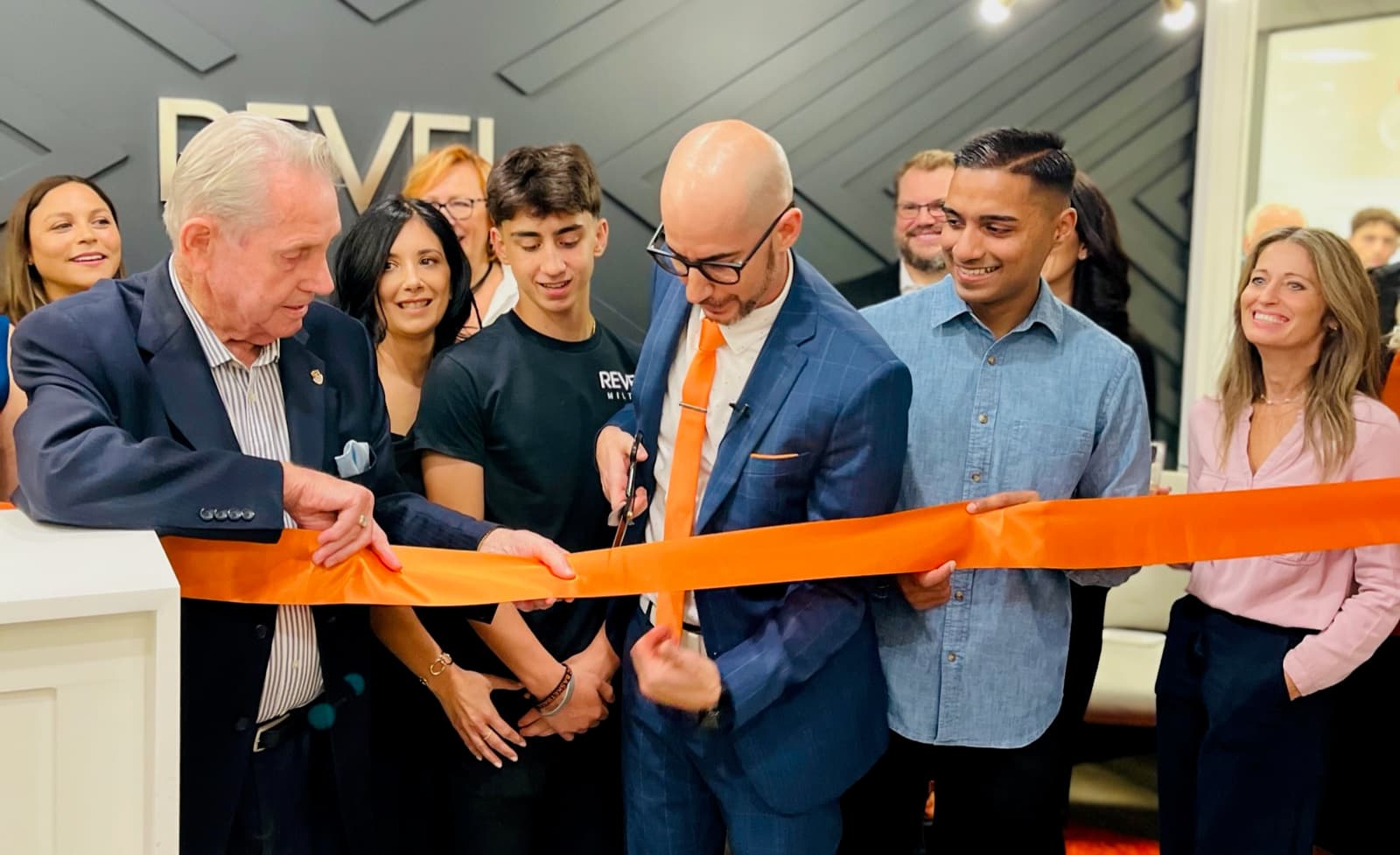 Adil Khalqi at a Milton ribbon-cutting ceremony