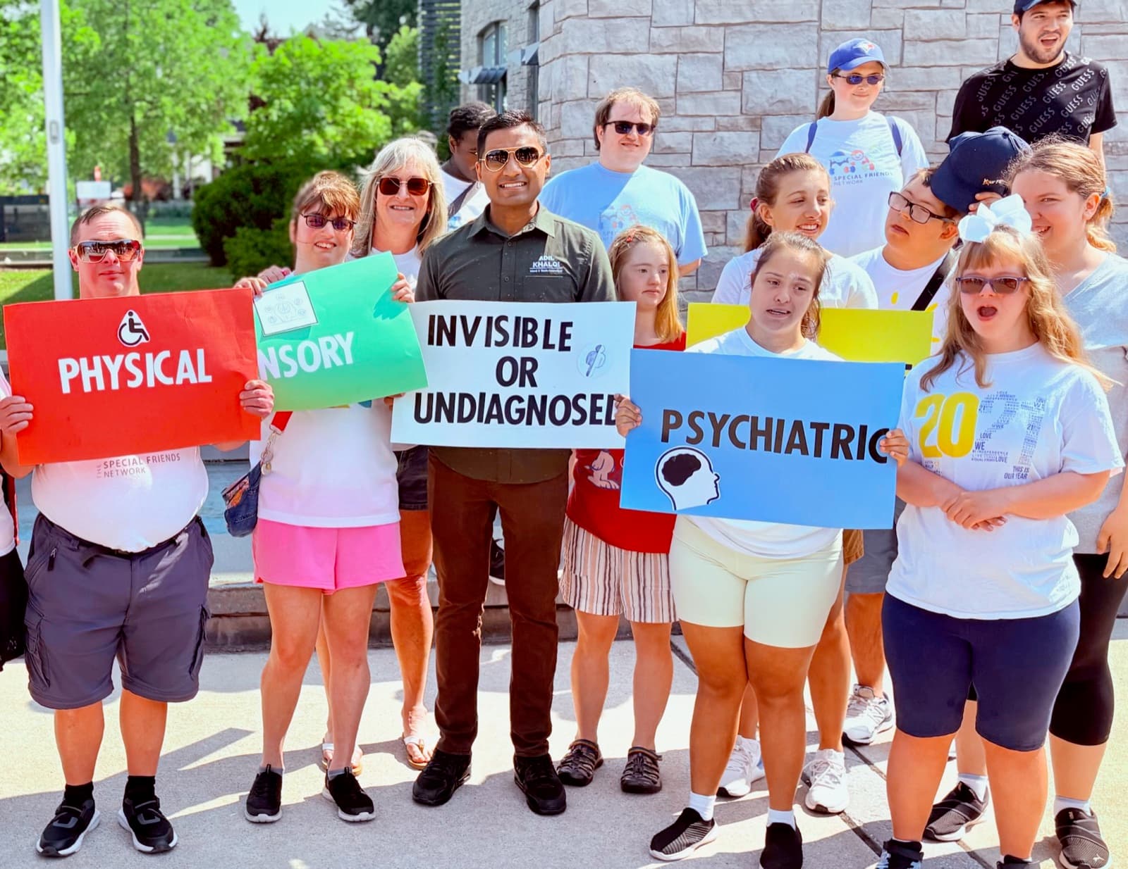 Adil Khalqi at a Milton disability awareness rally