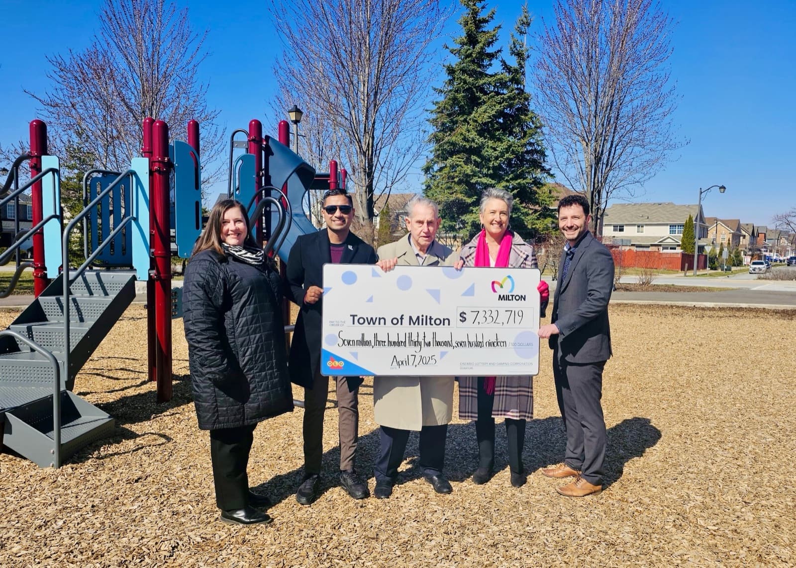 Adil Khalqi presenting park investment with Town of Milton officials