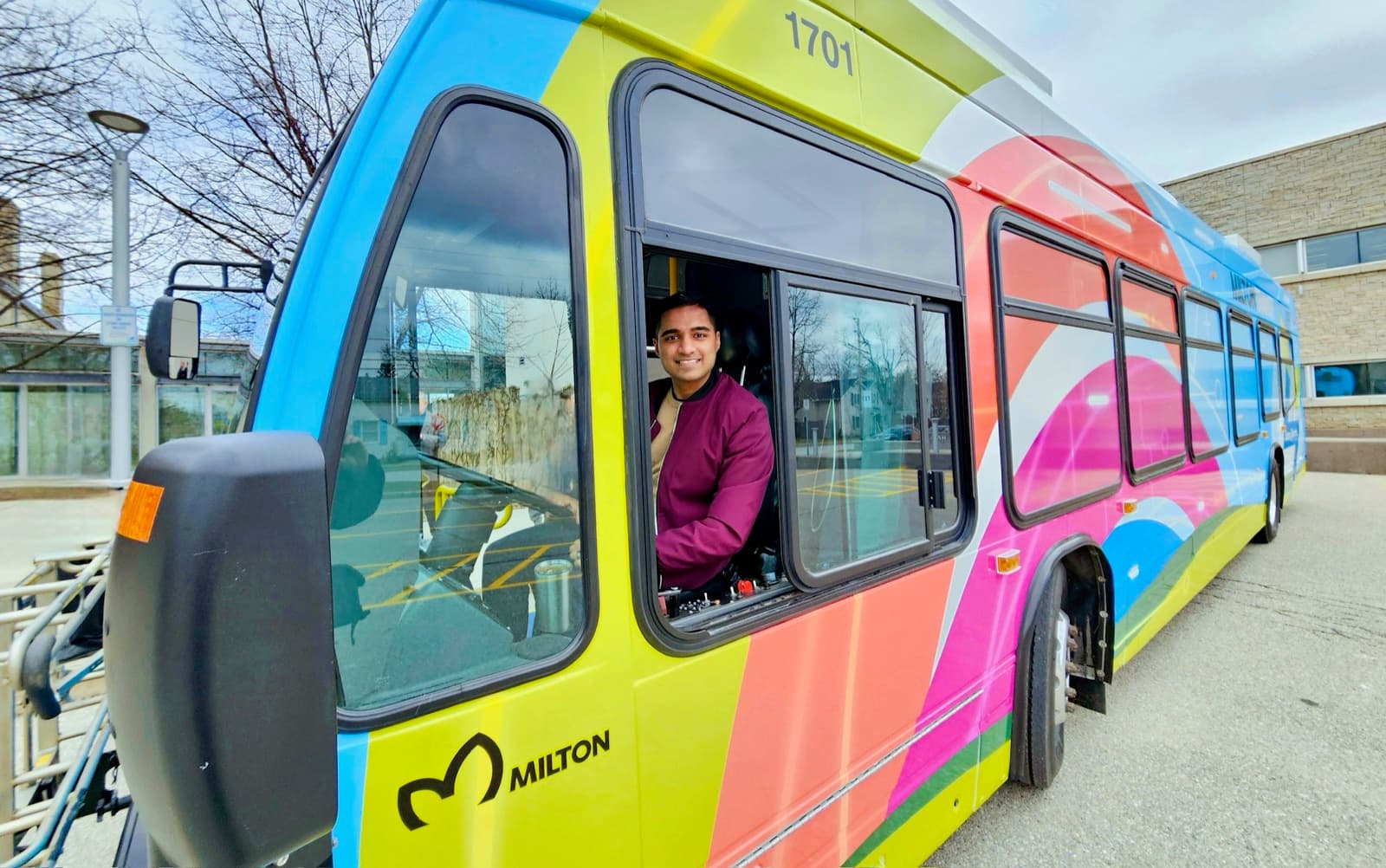 Adil Khalqi in a Milton Transit bus